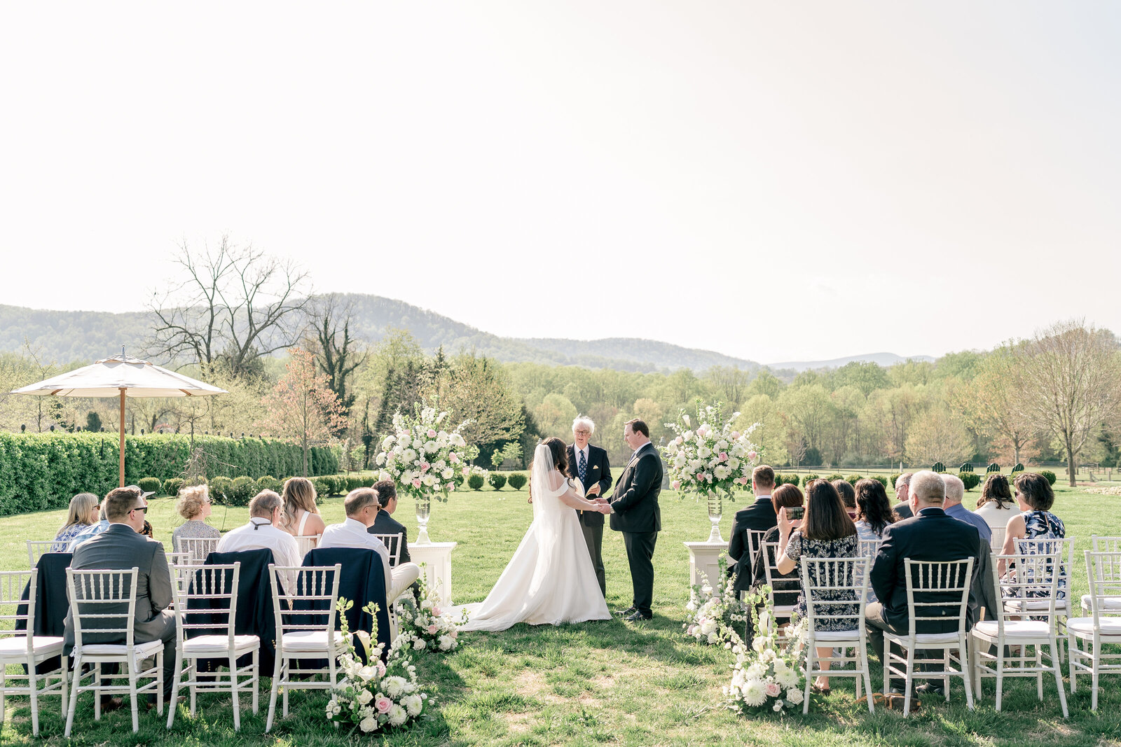 A wedding ceremony with a view of the mountains at The Inn at Little Washington in Virginia