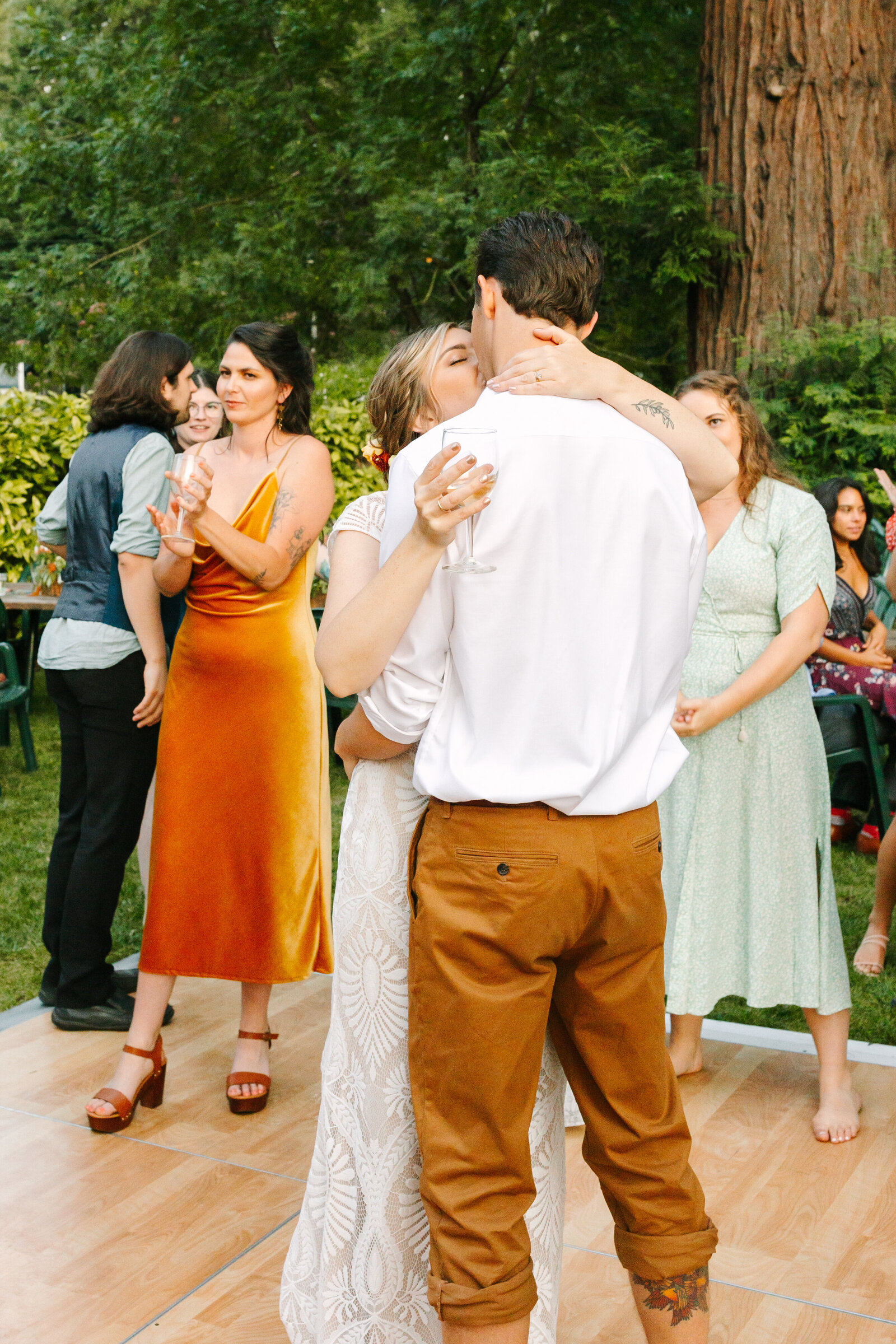 Colorful wedding reception in Santa Cruz, California in the redwood trees.