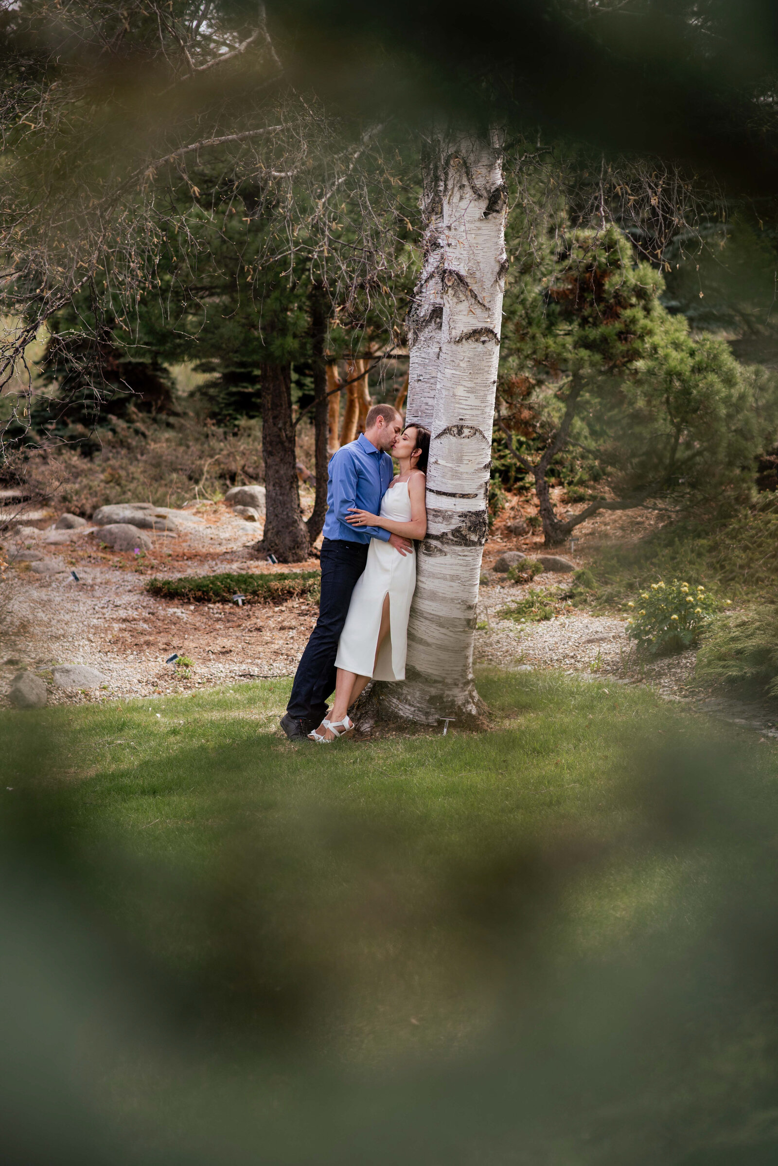 leaning against tree engagement session