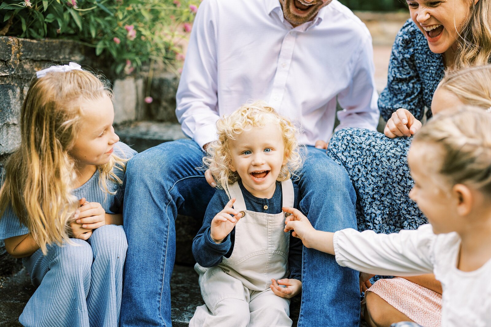 little blond boy laughing by Philadelphia Family Photographer