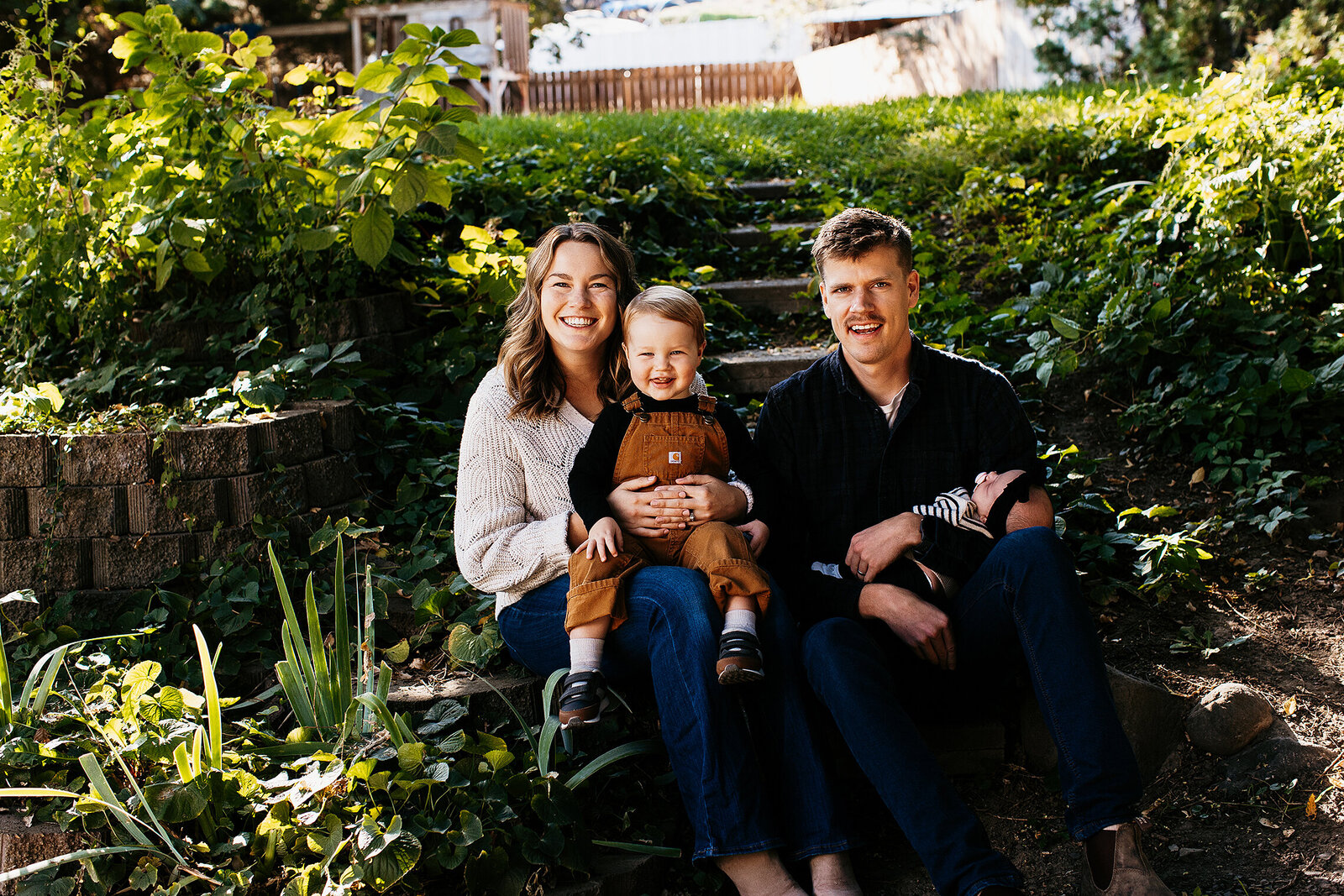 Bride and groom reading love letters before first look at Michigan wedding