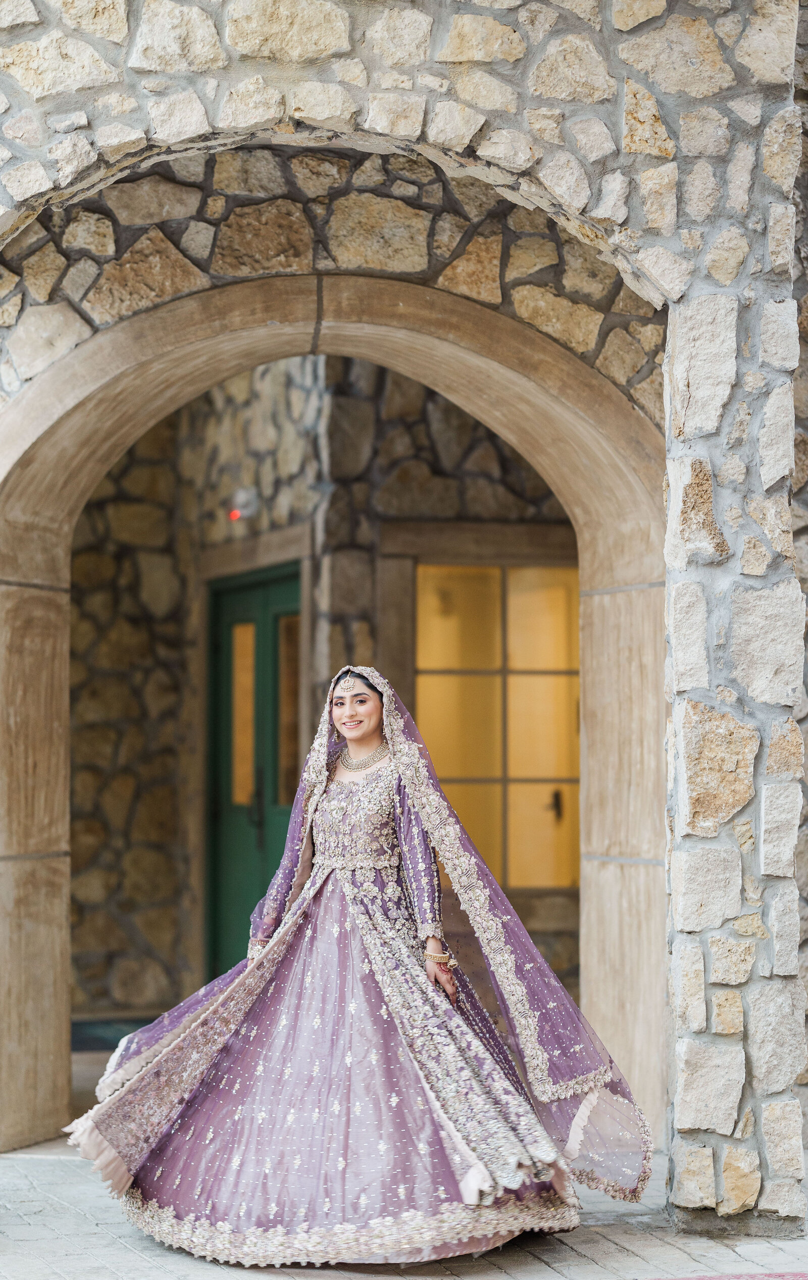 Bride-in-wedding-dress-twirl-pose