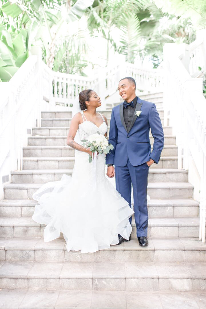 Hilton Hawaiian Village Wedding Photography, bride and groom walking down stairs together
