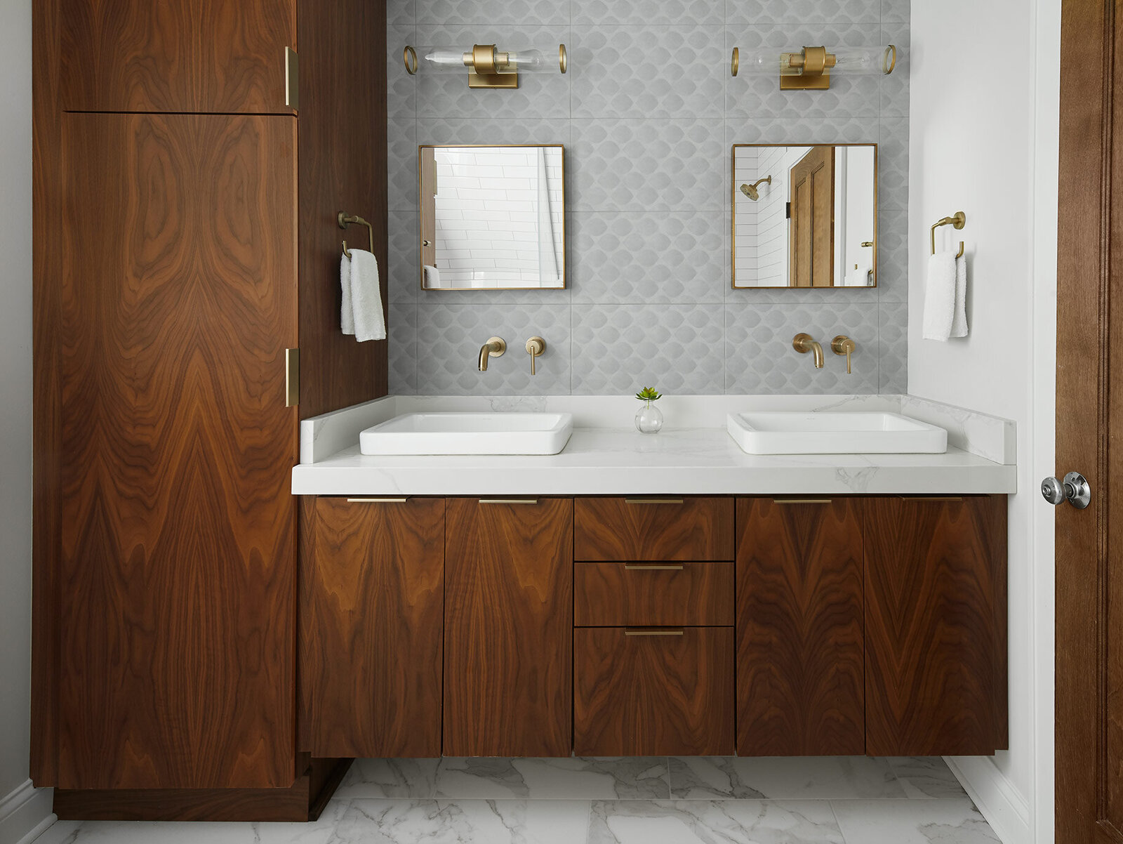 Midcentury bathroom with dark wooden cabinets and rectangular mirrors