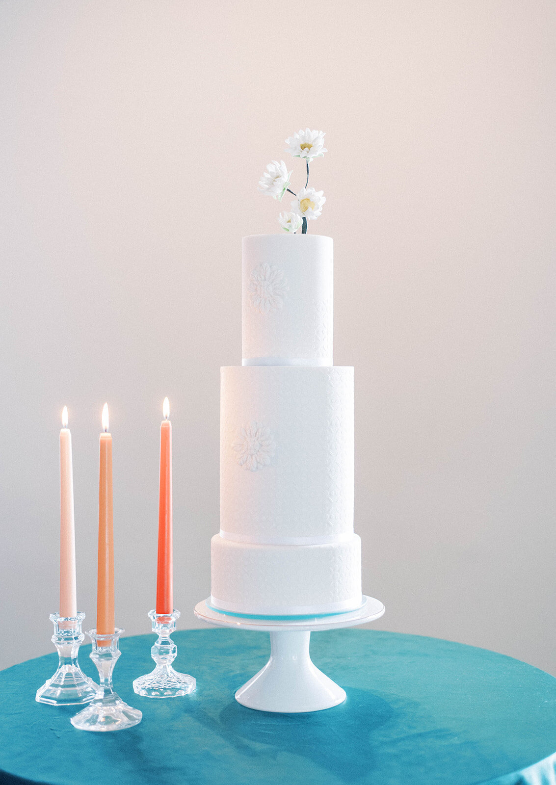 all white wedding cake three tiered cake