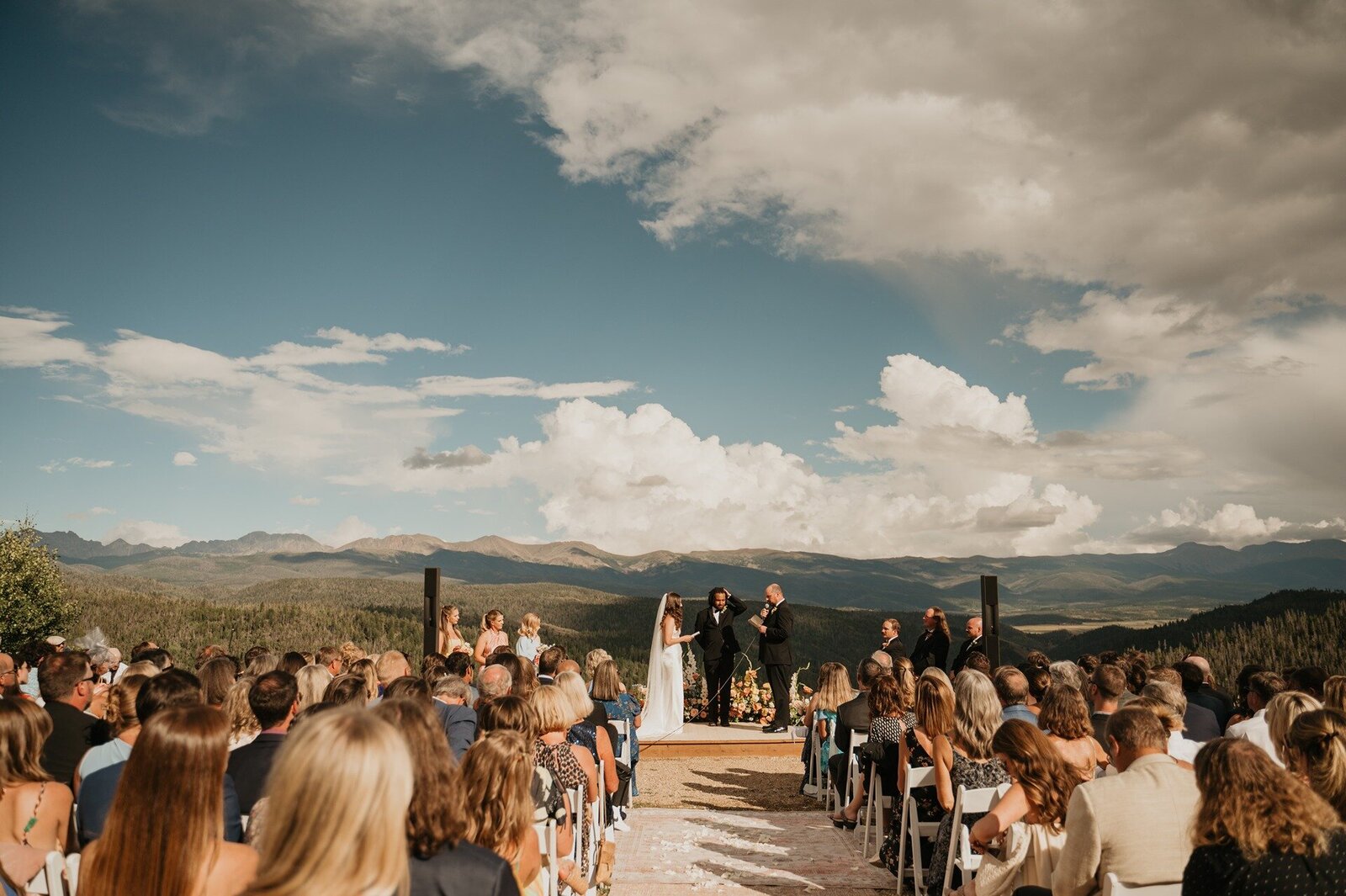 Reception at Manor House with neutral linens and green floral centerpieces