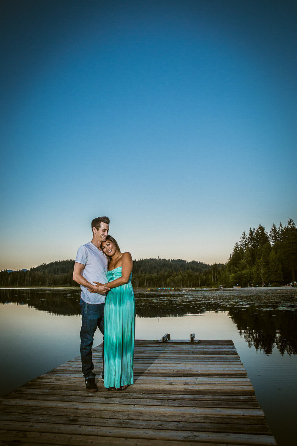 Couple standing on a dock