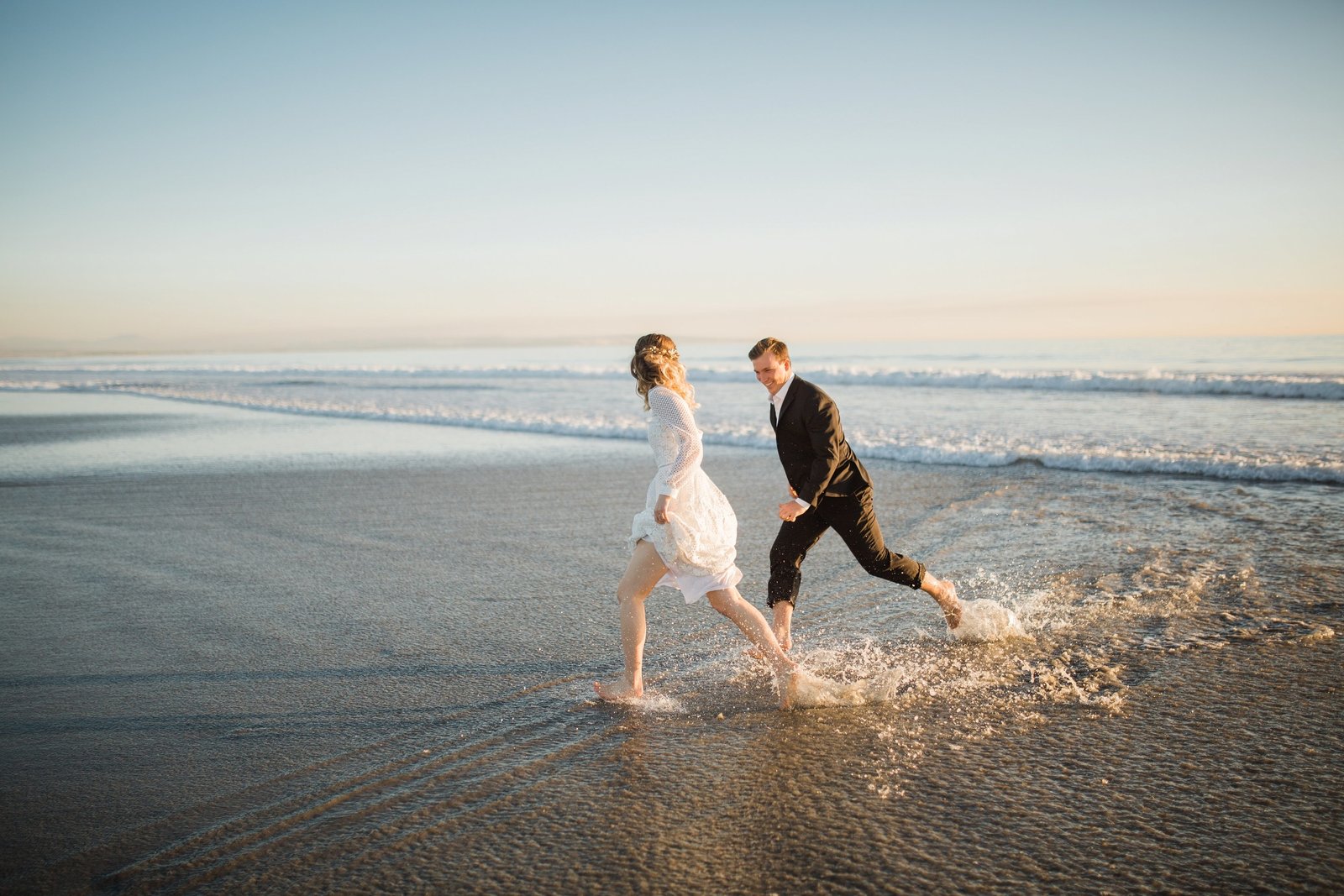 Destination adventure elopement photos at the beach in San Diego by elopement photographer My Sun and Stars Co