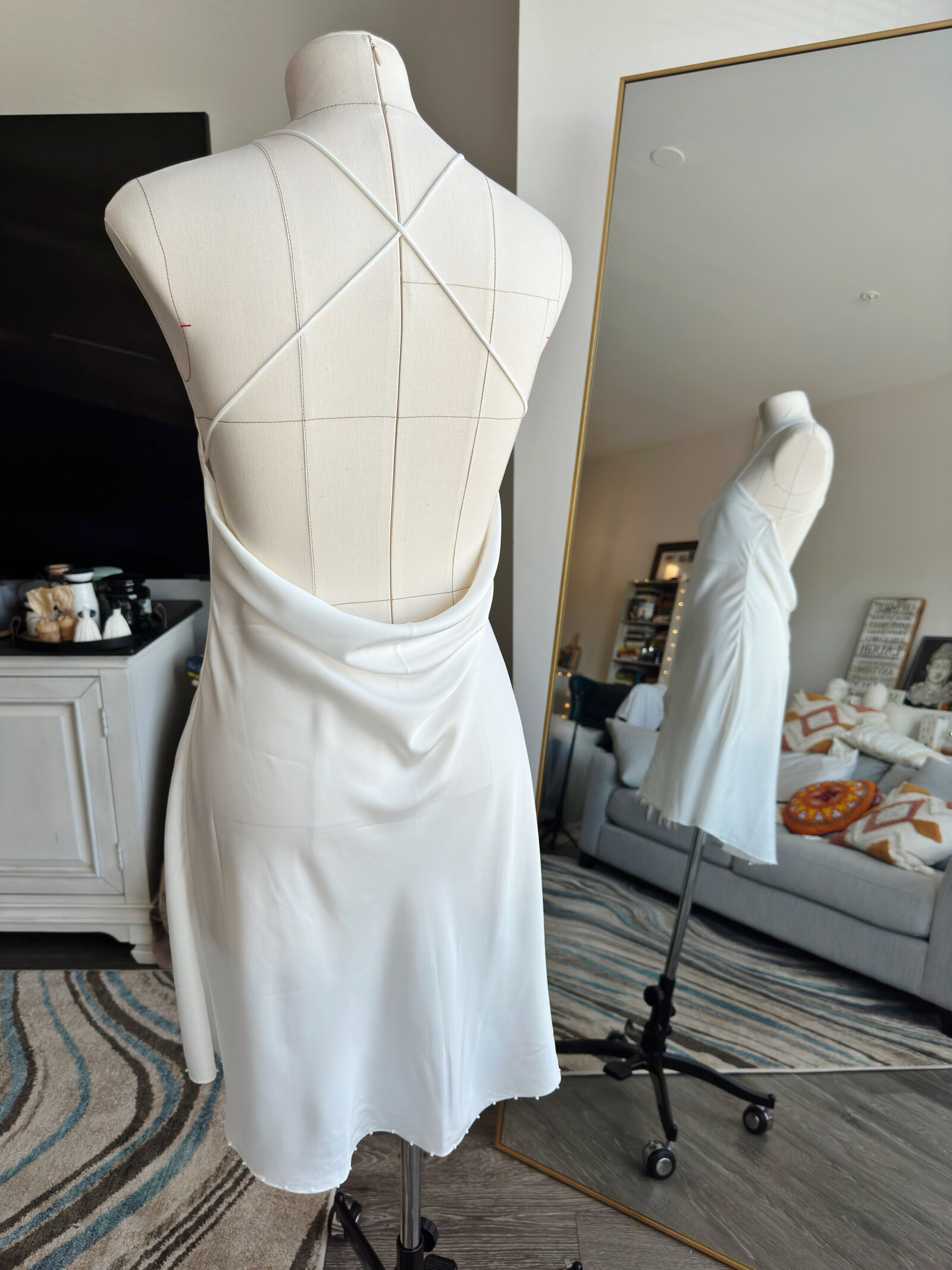 Satin slip dress with hand-sewn beads for modern romantic brides
