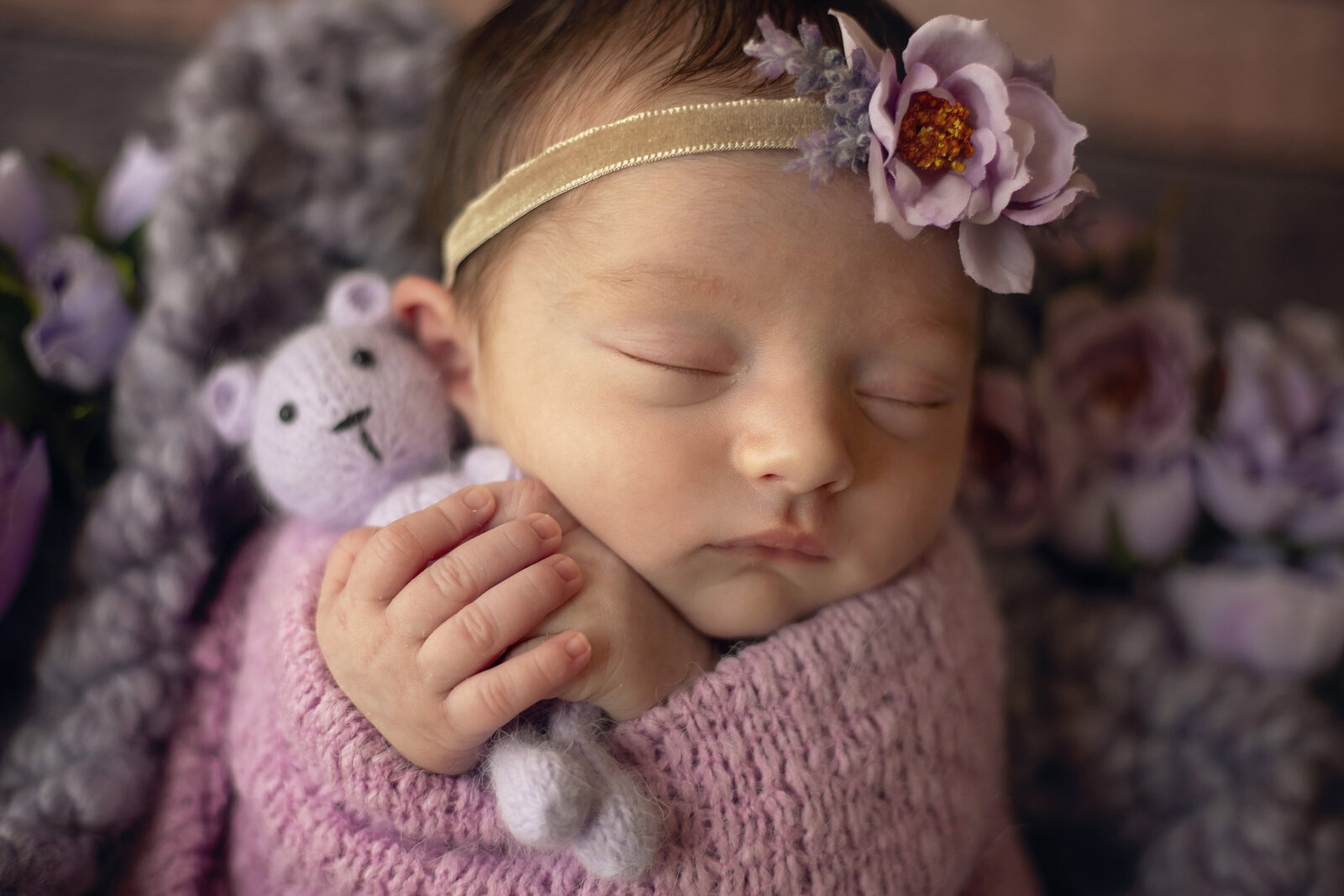 Albuquerque-newborn-photographer-session-with-baby-girl-and-purple-teddy-bear