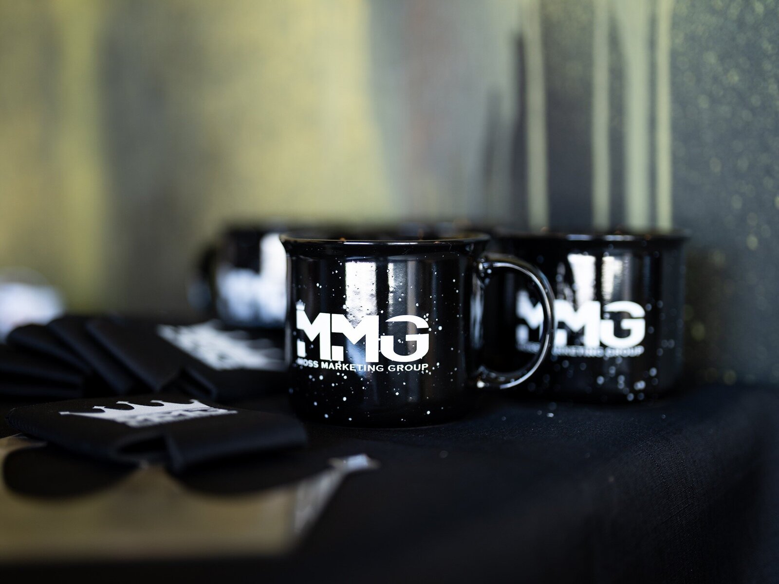 Branded Moss Marketing Group mugs in the office