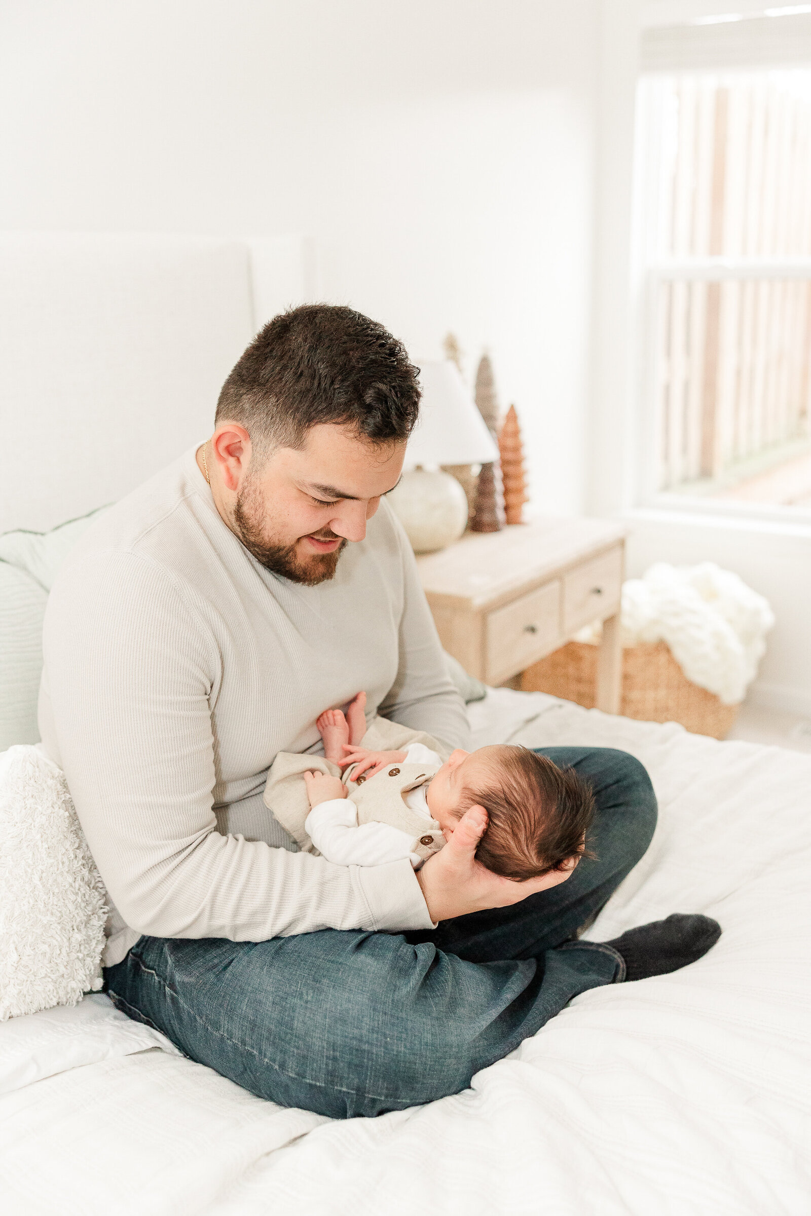 Akron newborn photographer father and son lifestyle session light and airy
