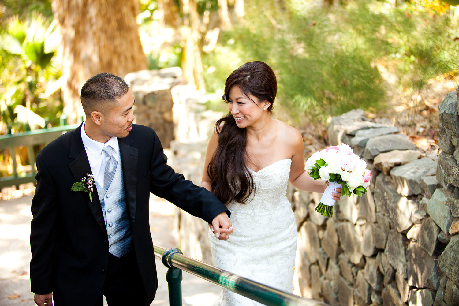 walking in balboa park bride and groom