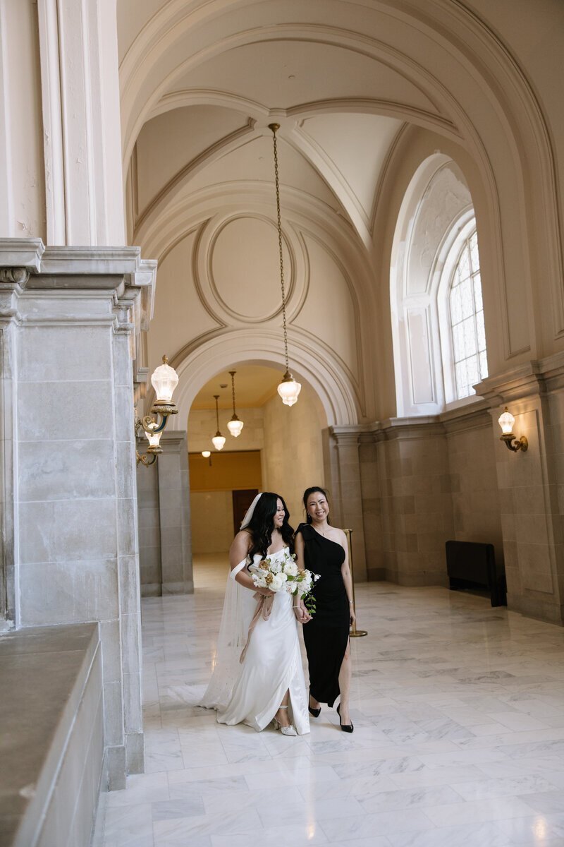 Bride and groom in city building by northern california wedding photographers