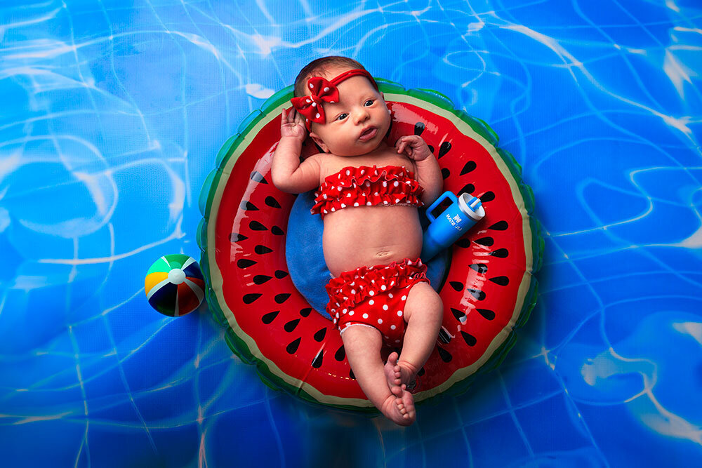 summer-newborn-photography-swimming-pool-creative-colorful-unique-watermelon-floatie-bikini-polka-dot-red-blue-stanley-amazing