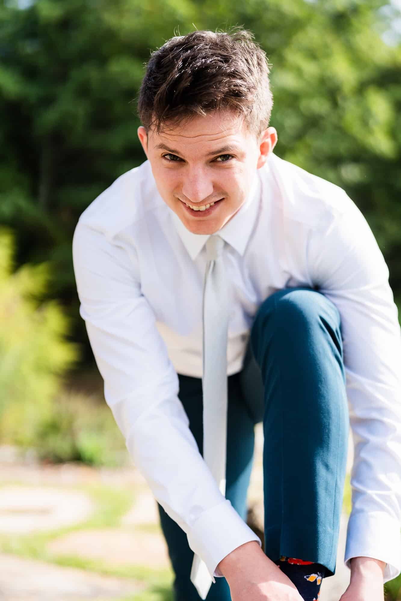 the groom, Harrison, getting ready  at North Georgia wedding venue
