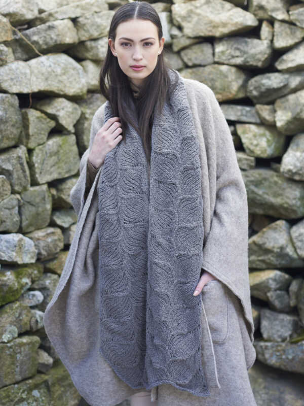 Natural makeup for a model in a grey coat
