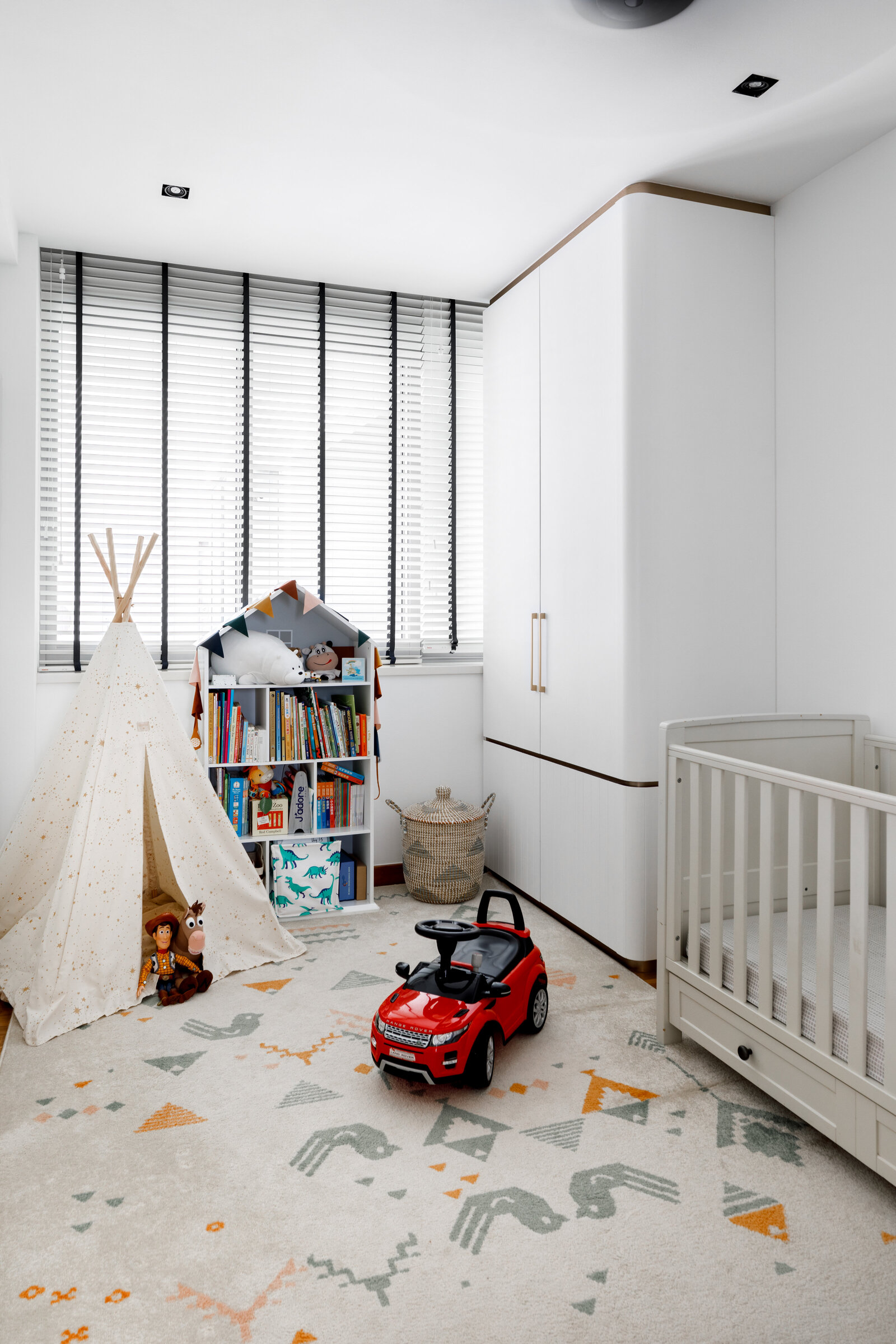 kids bedroom with tent and toy car