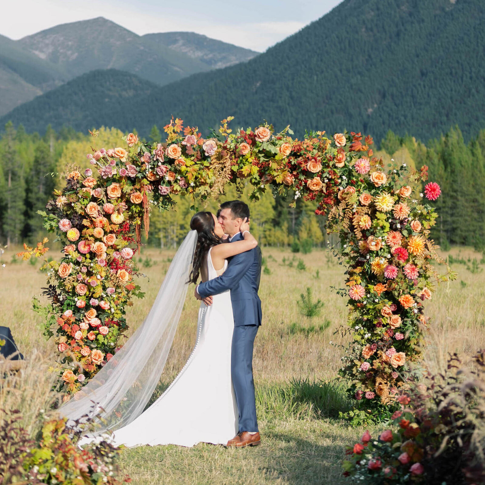 jennifer mooney photography - bride and groom kissing at ceremony