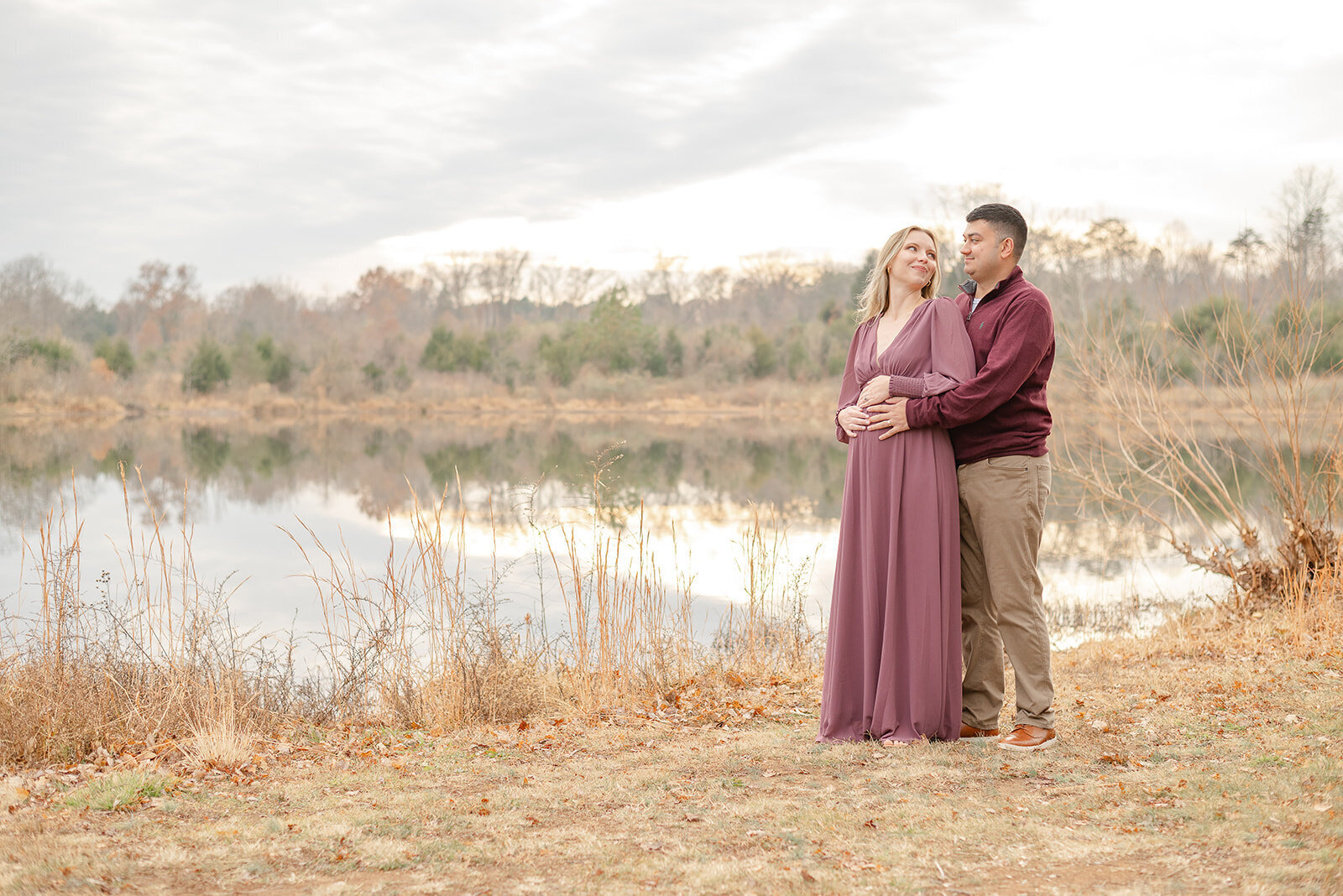 first time parents hug each other during Fauquier County, VA maternity photo
