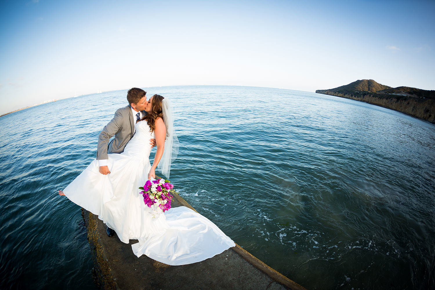 couple with ocean in back ground at ocean view room