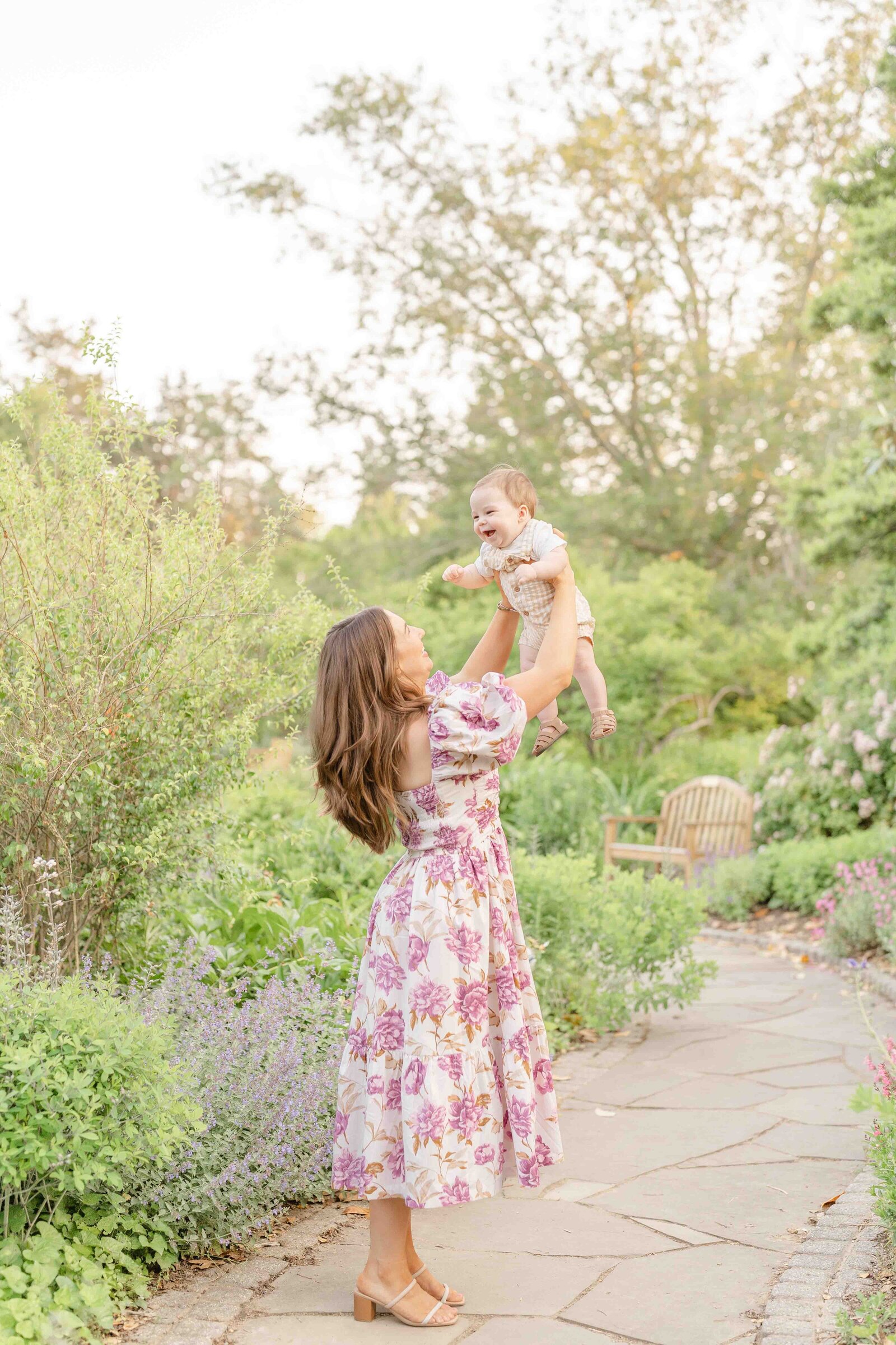 mom playing with baby during spring minis in Fairfax County, Virginia