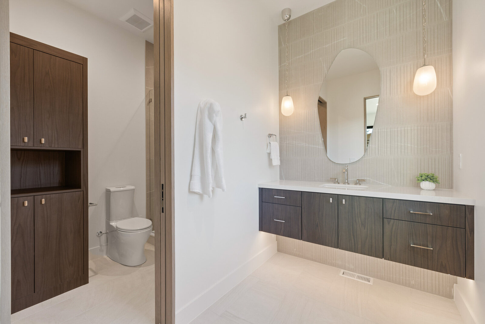 Chalet-and-Co-Park-City-Interior-Designer-bathroom-vanity-floating-shelves-organic-mirrors
