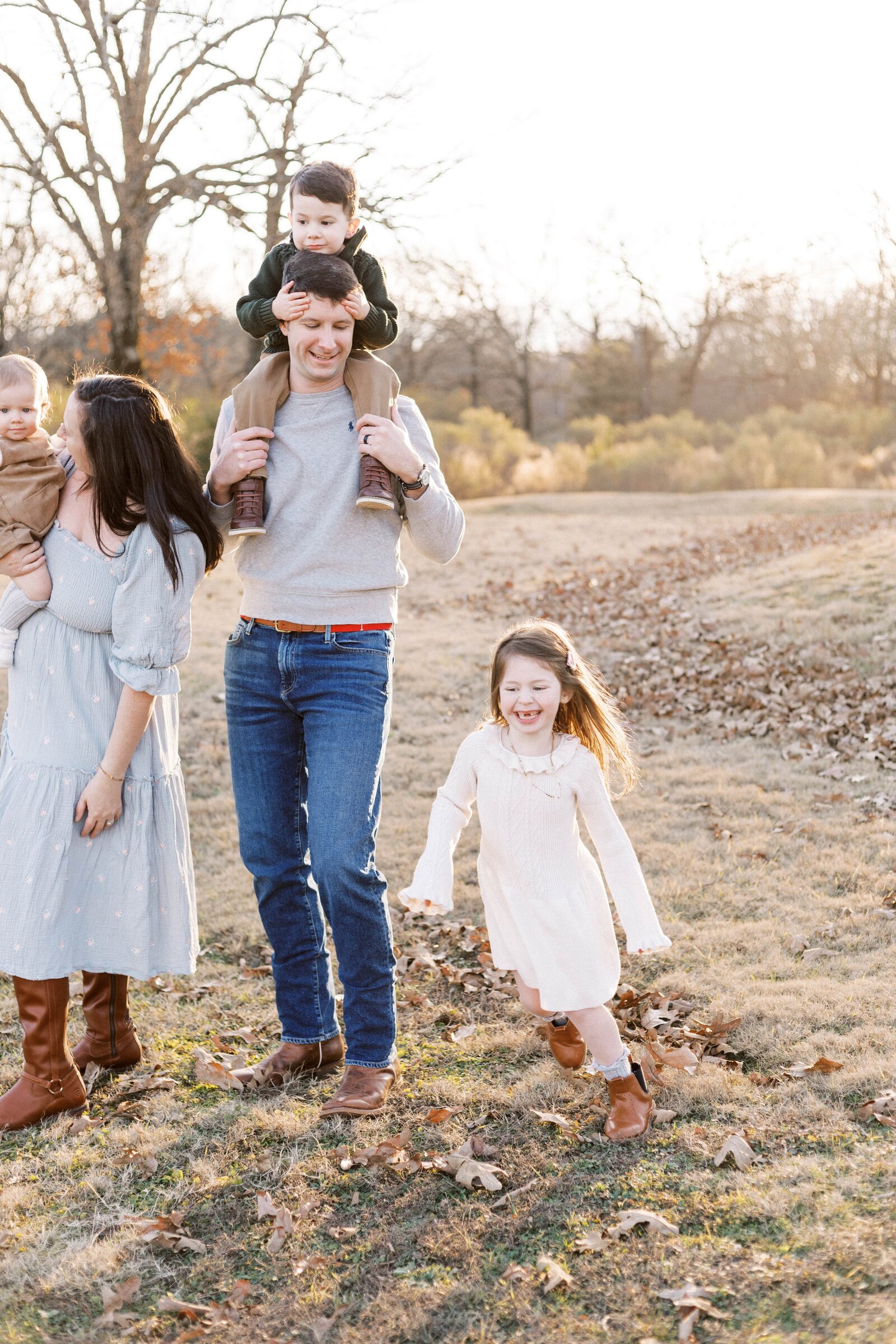 kids running around parents during peoria illinois family photos 