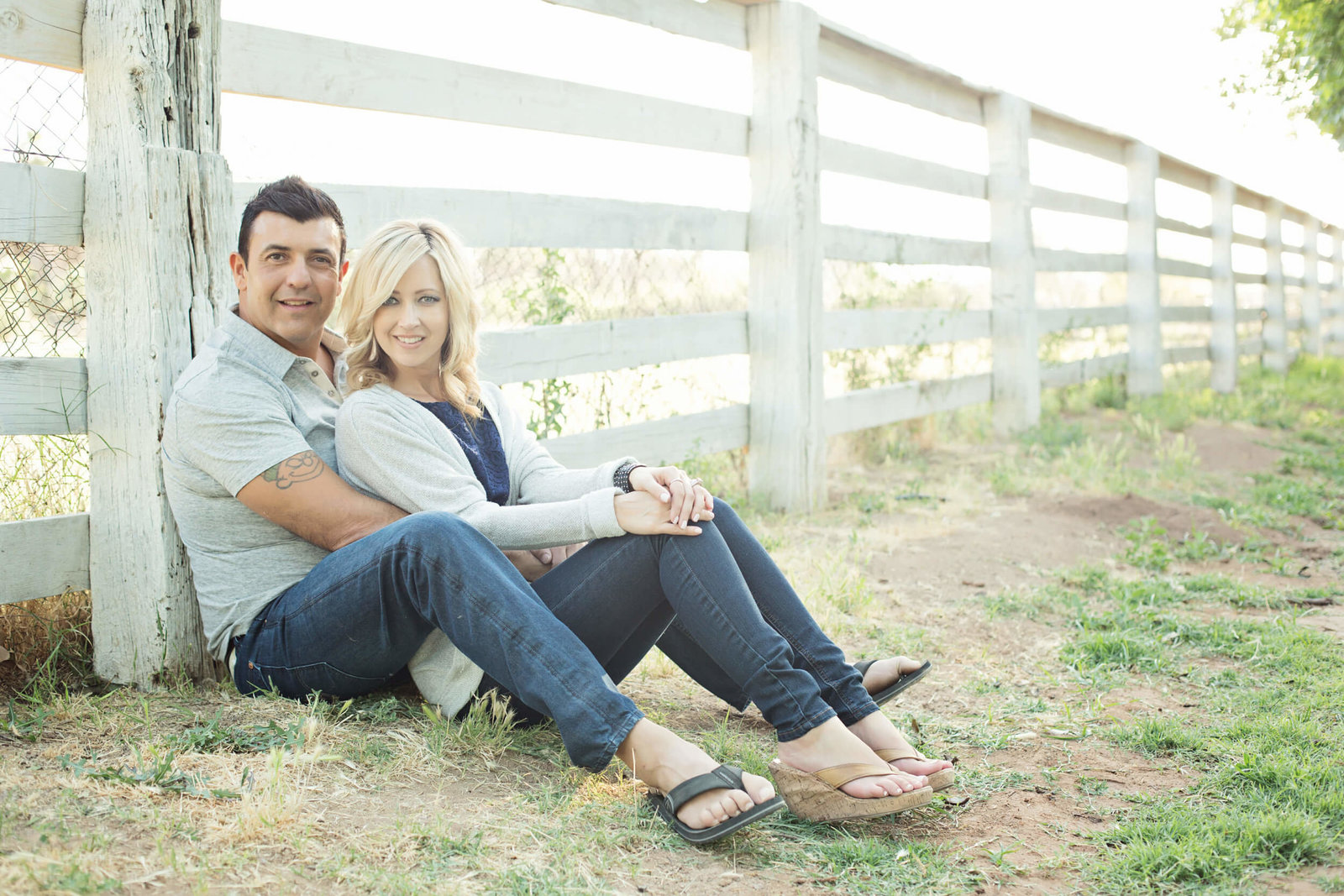 white pickett fence couples photoshoot