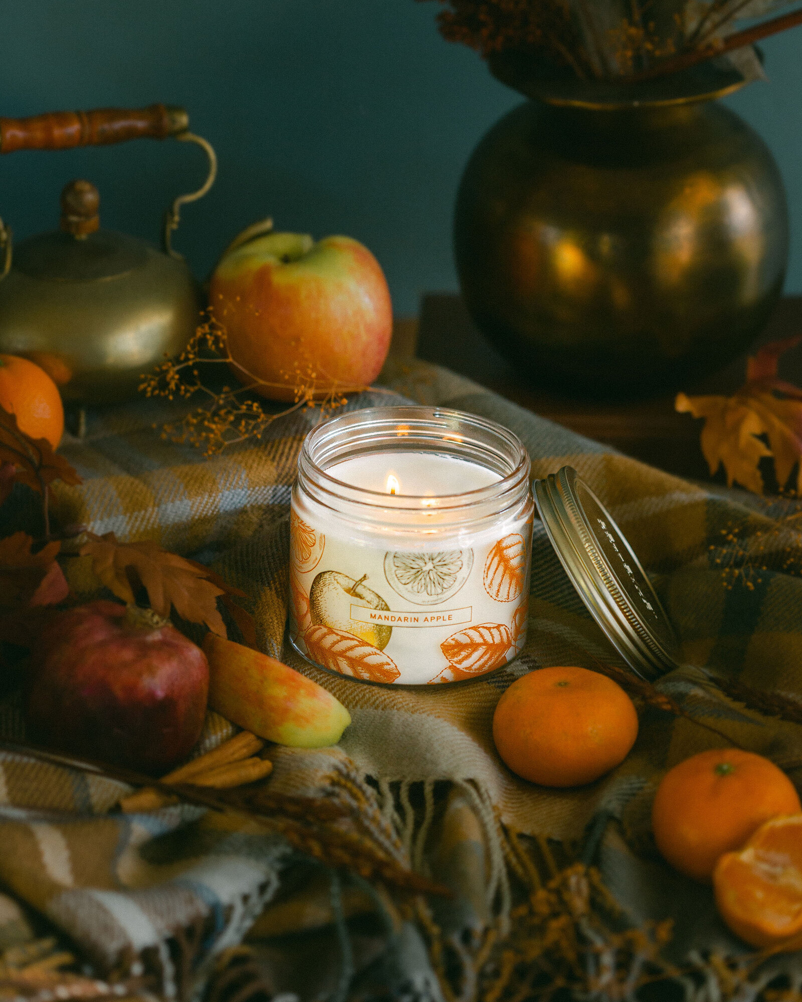 Cozy fall candle styled product photography still life tea plaid New York