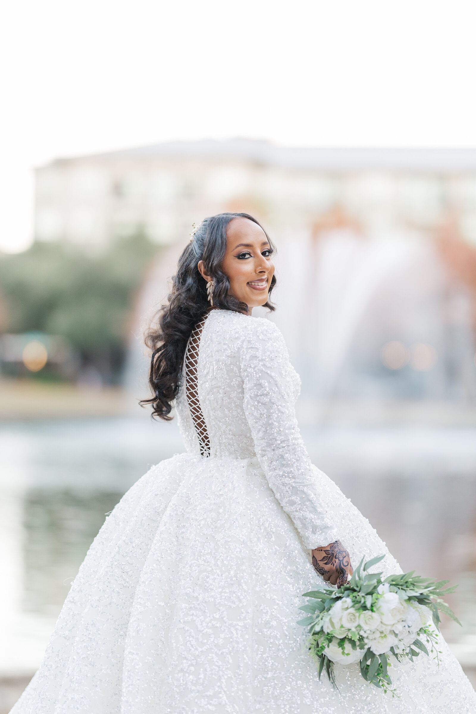Solo bride photography before wedding, outdoor infront of the water fountaint
