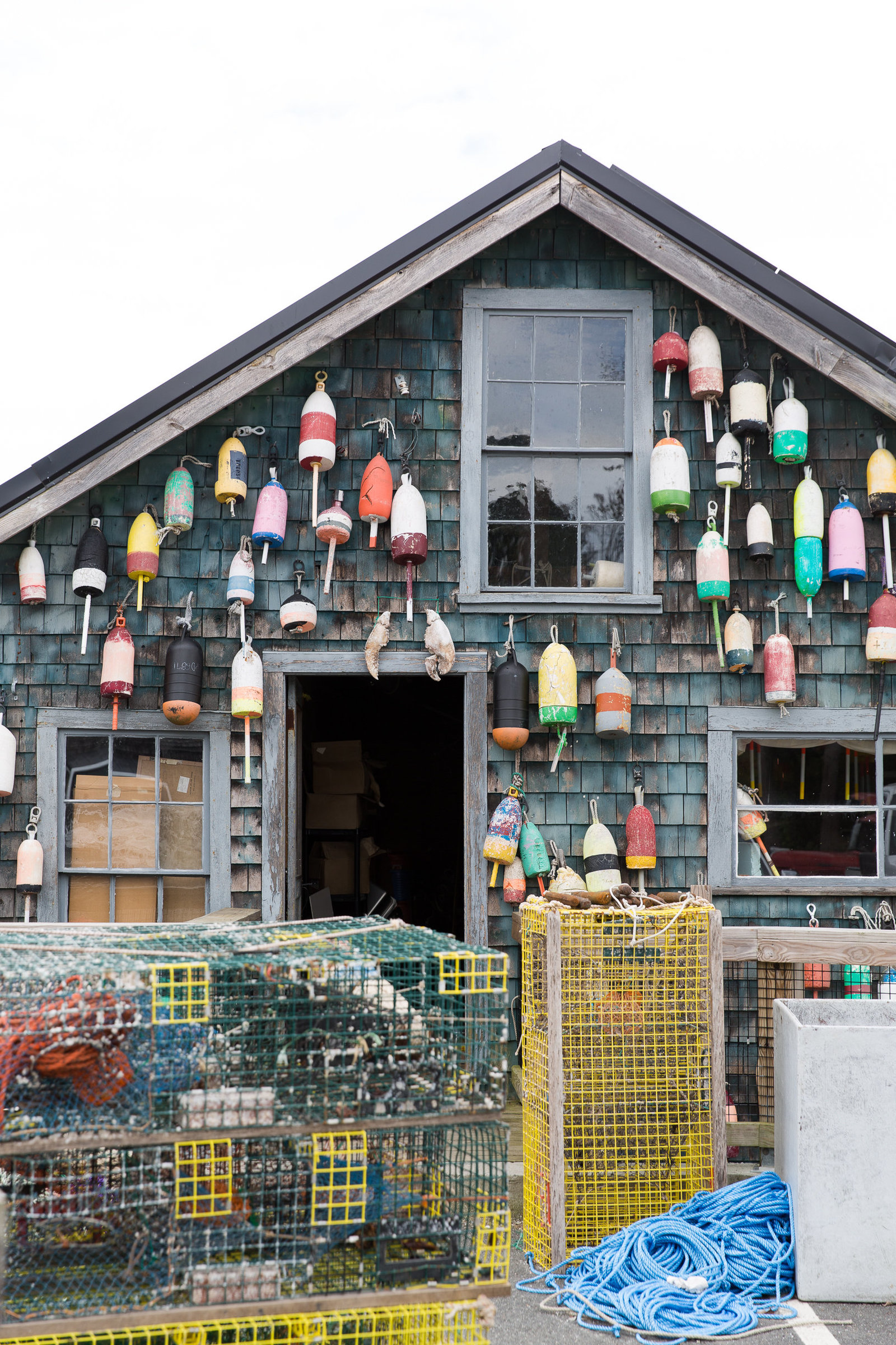 Lobster pots hanging on an old lobster shed in Maine