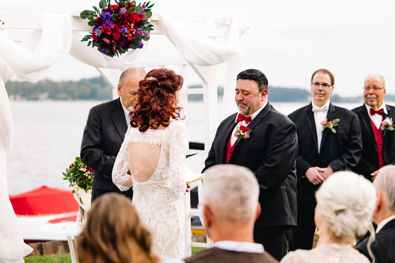 Groom sheds a tear while listening to his new wife's beautiful vows to him