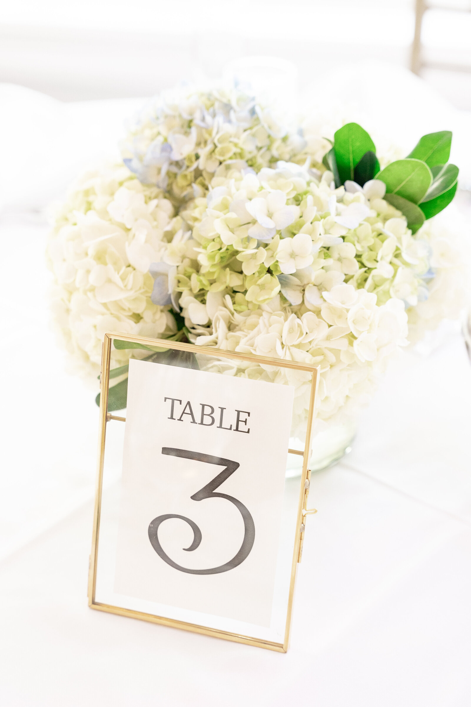 gold frame table number with hydrangea centerpiece The Breakers spring lake