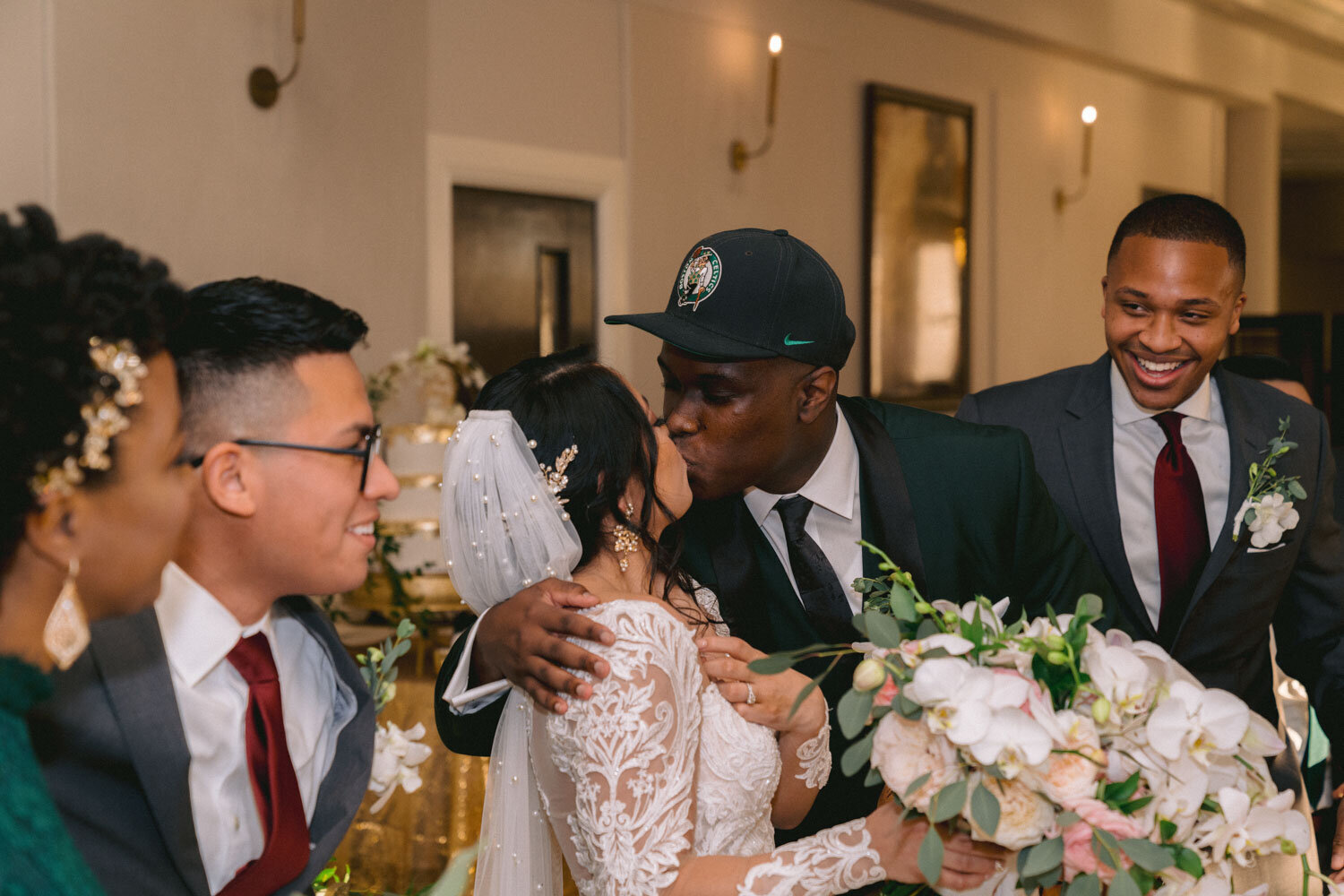 Bride and groom kissing on their wedding reception