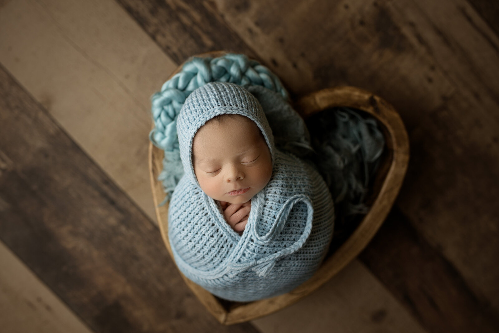 Newborn in heart bowl