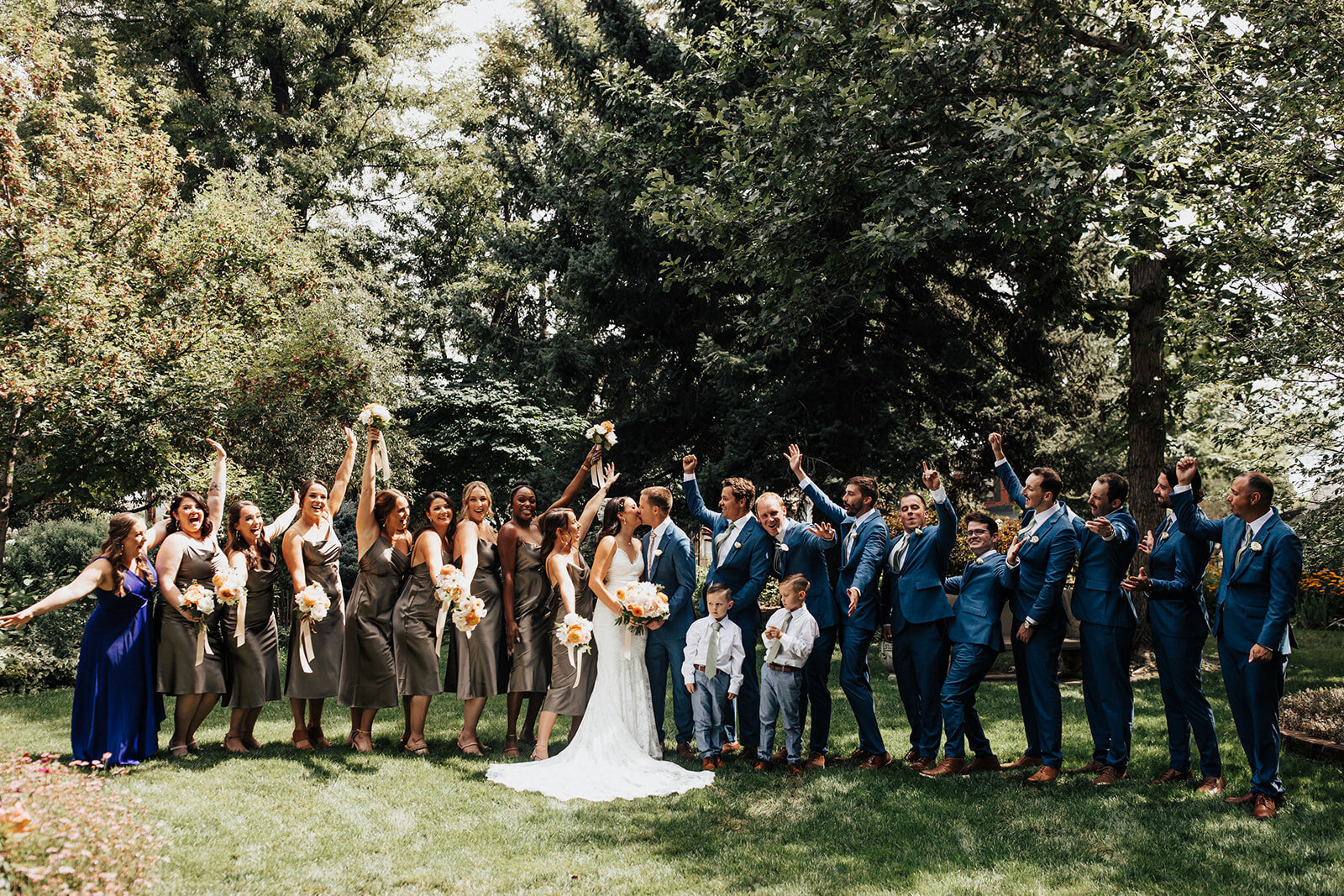 outdoor group shot of wedding at the St Vrain, boulder county wedding venue