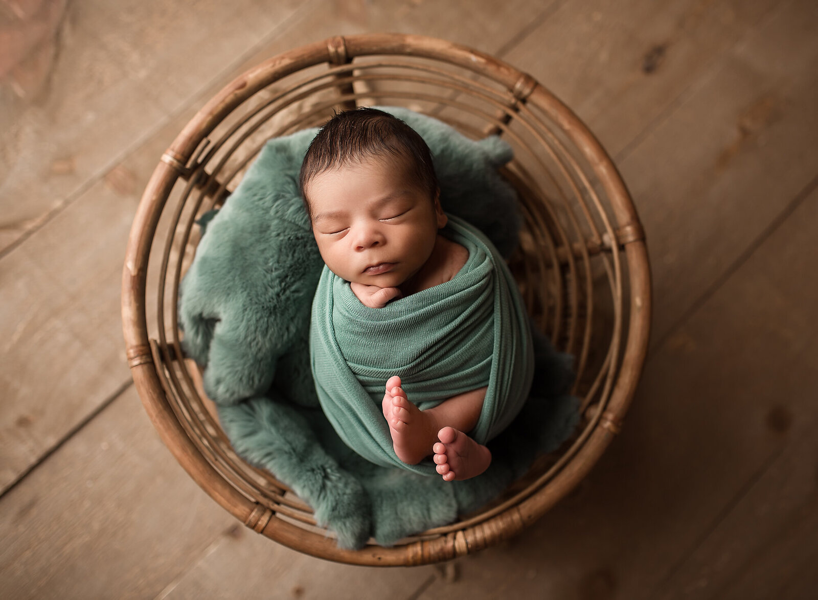 baby boy in teal with half wrap