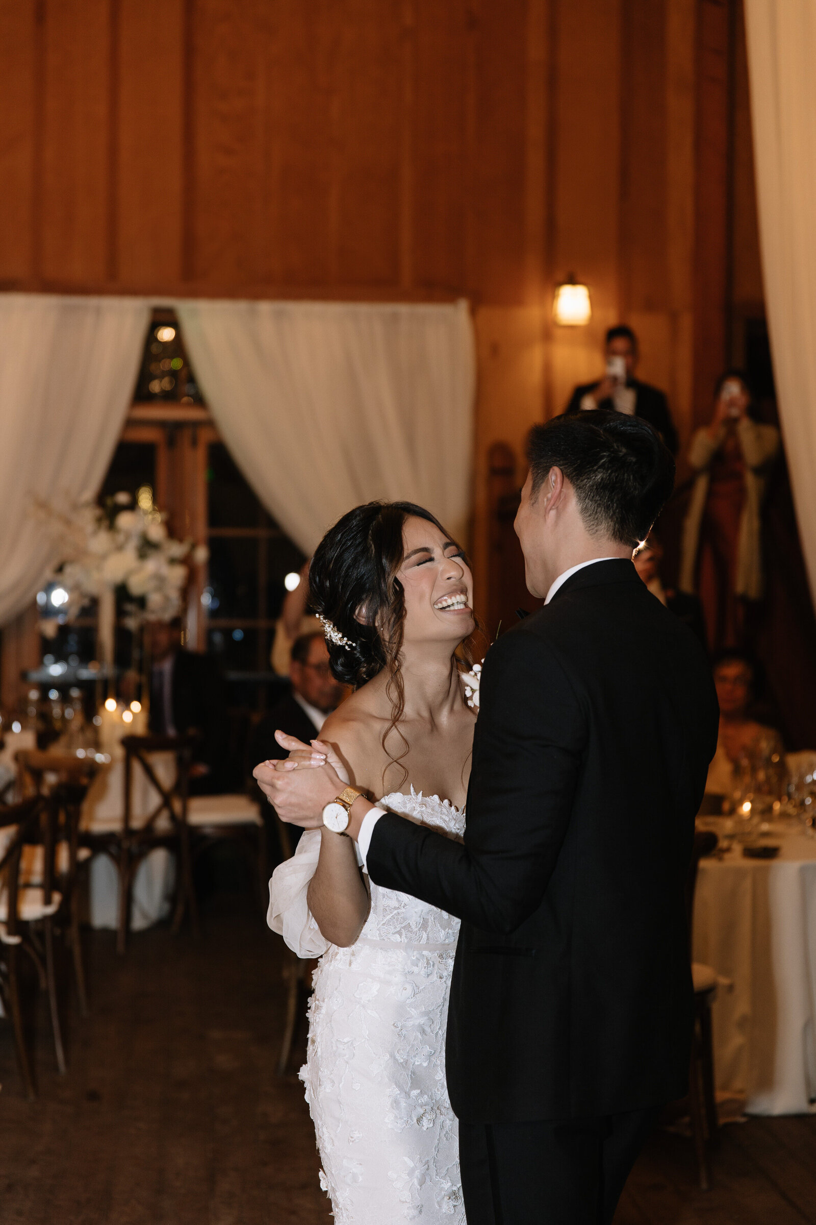 Couple dancing wildly on the floor with flash photography at Washington reception