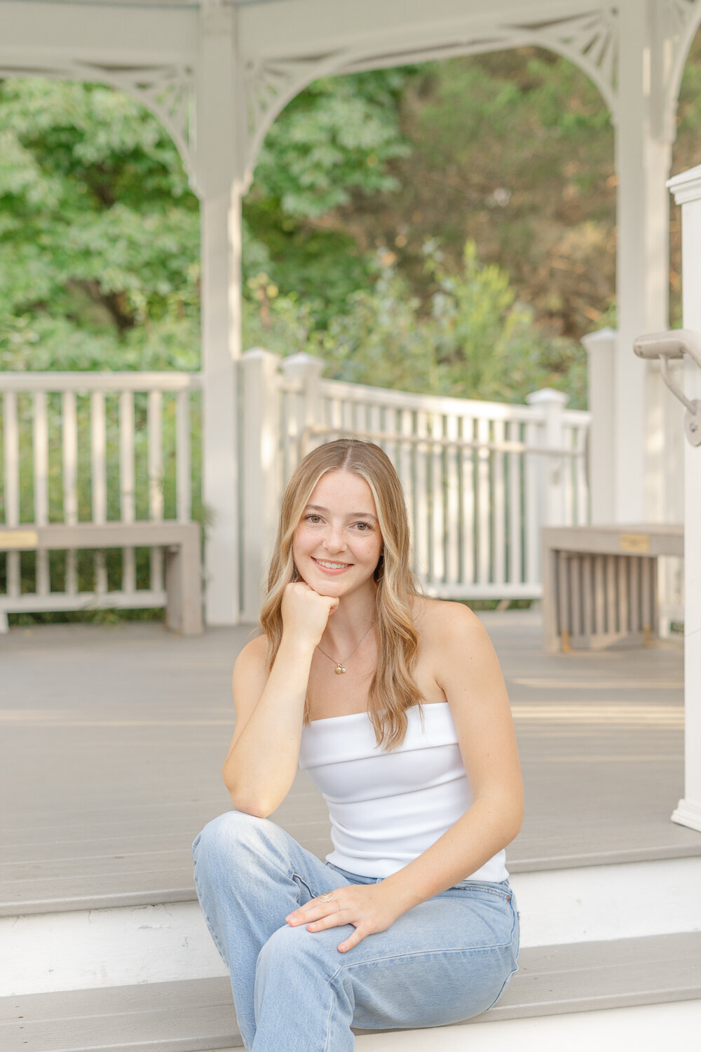 girl on the stairs during DMV senior photo