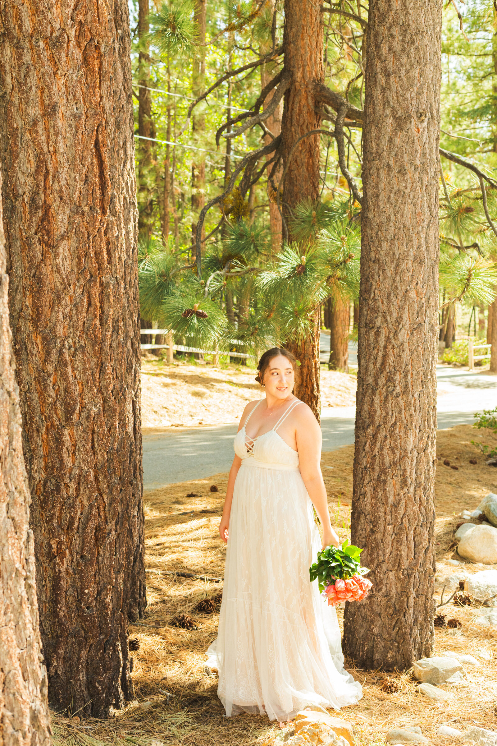 A boho bride celebrates her intimate elopement at a cabin at Big Bear Lake, California.