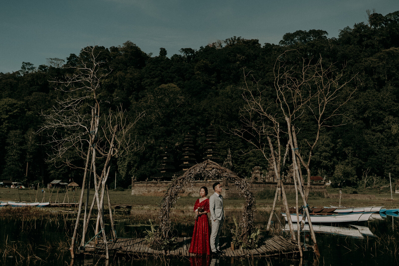 couple standing together in lake Tambligan Bali