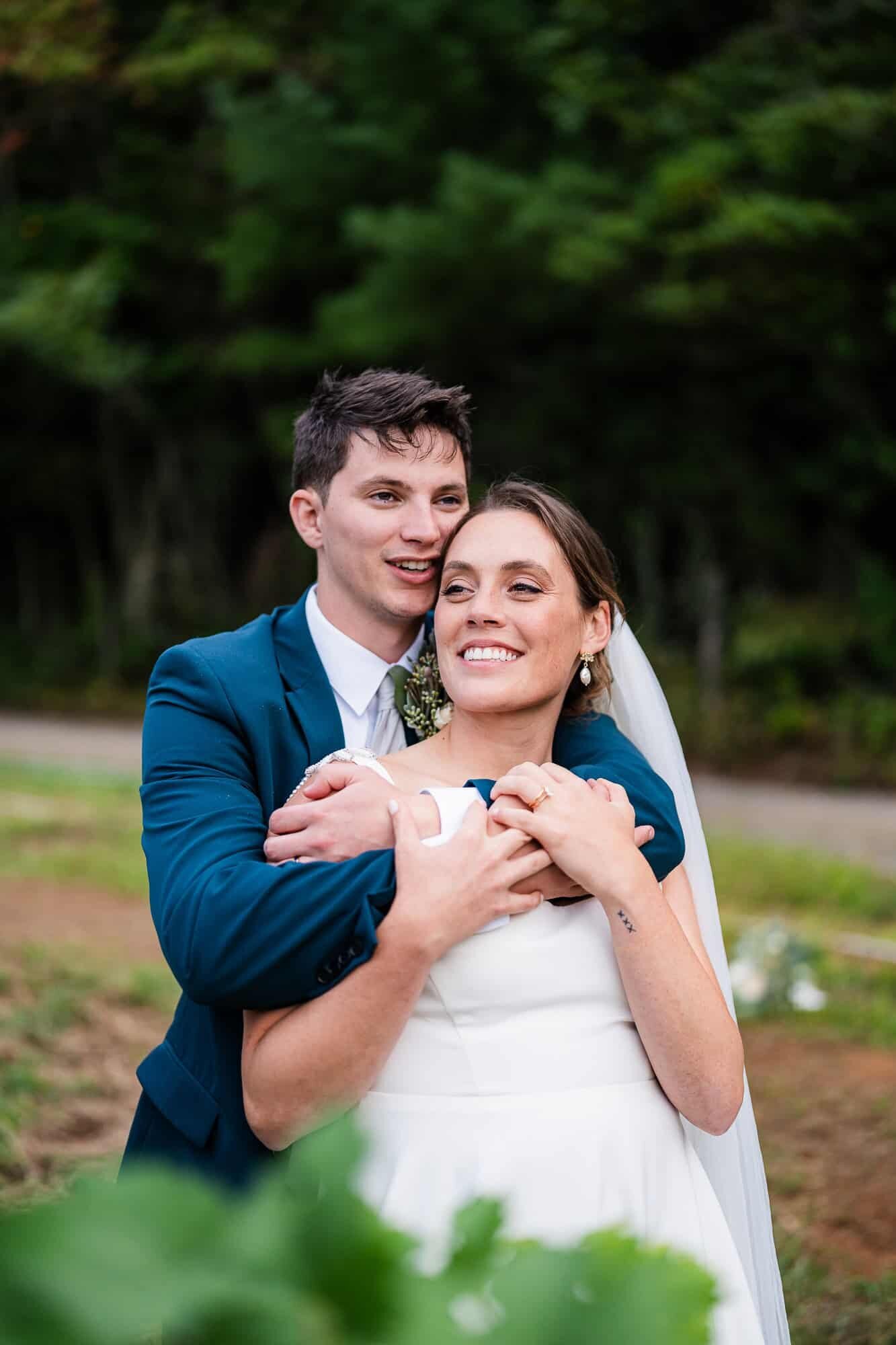 bride and groom having a private moment during this hectic wedding day at Terra Incognita 