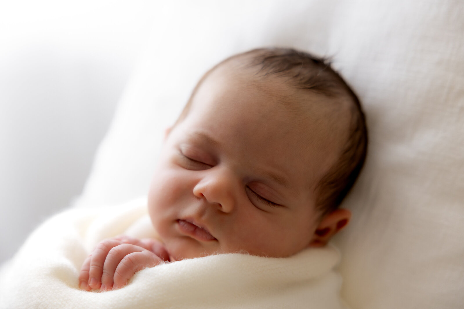 newborn boy sleeping in lifestyle posing 