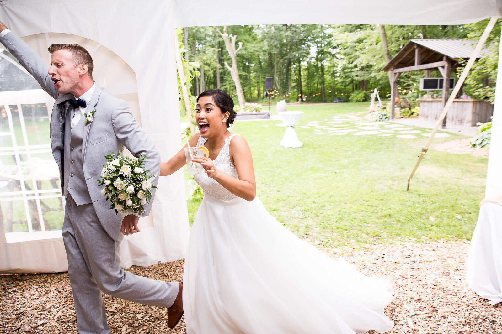 Bride and groom entrance during wedding reception.