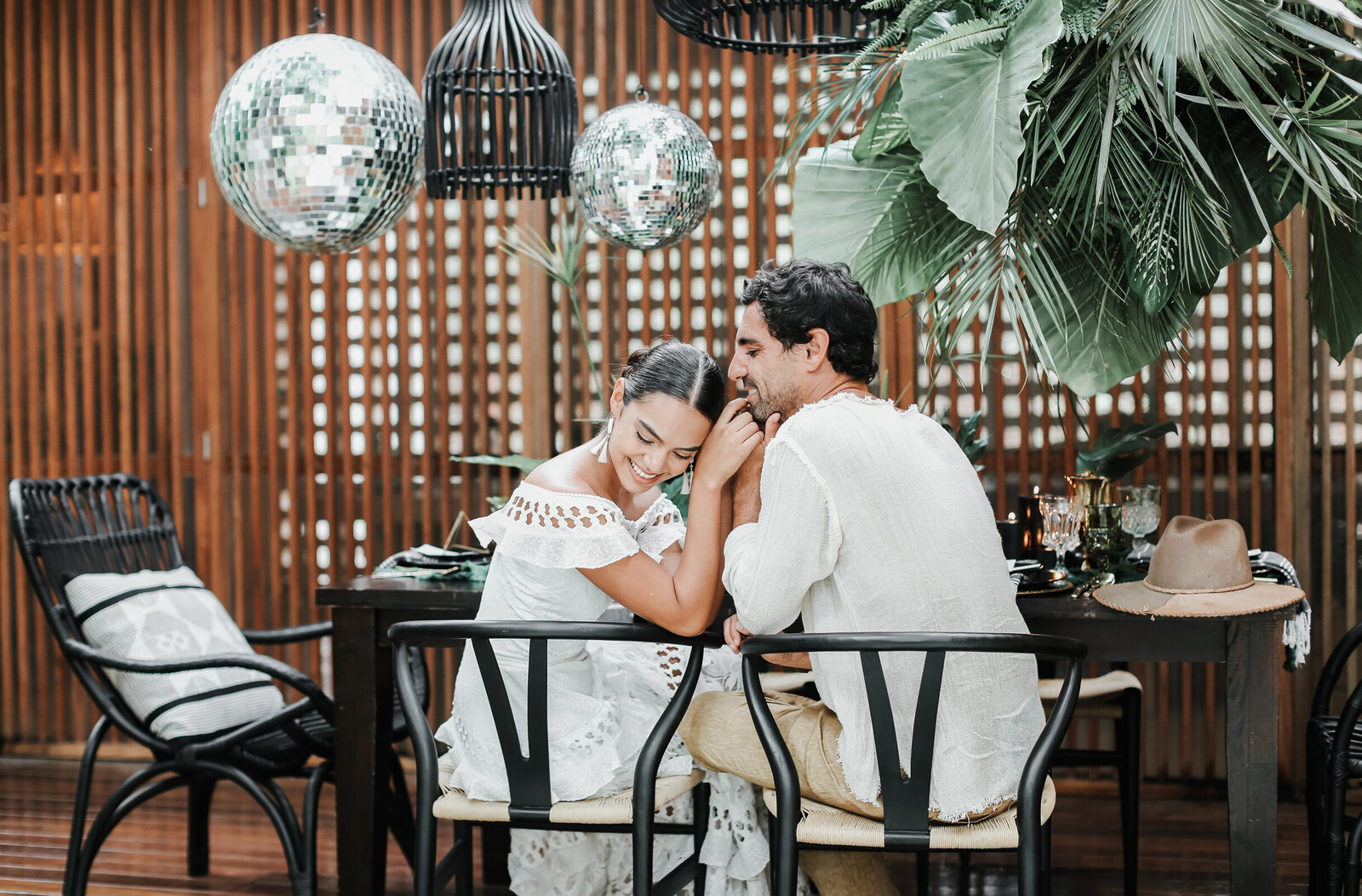 couple-sitting-at-Tulum-wedding-table