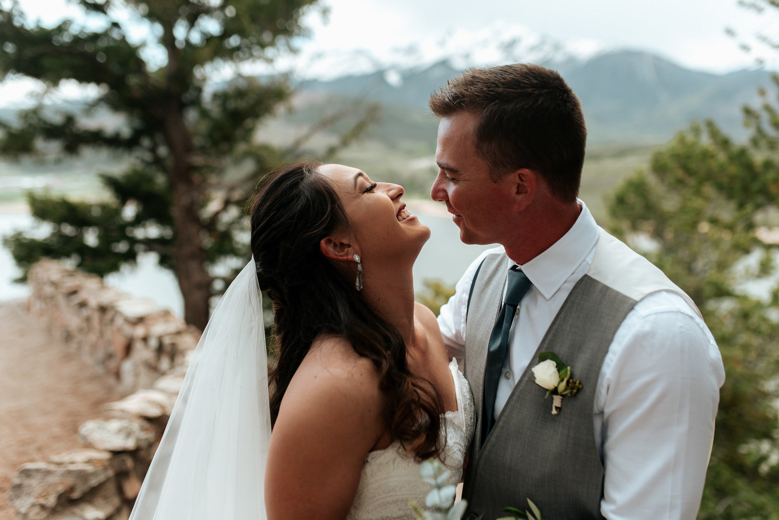 Happy couple looks at eachother after being married in Breckenridge Colorado.