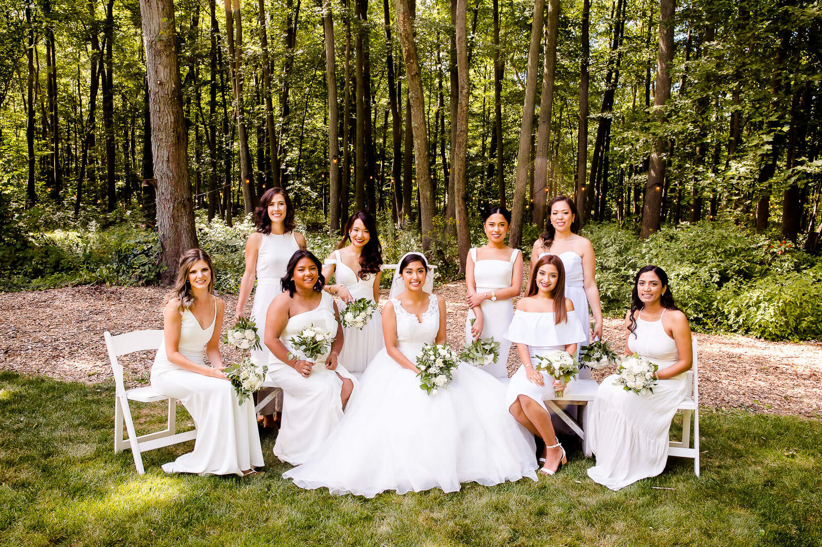 Portraits of bridesmaids in white dresses.
