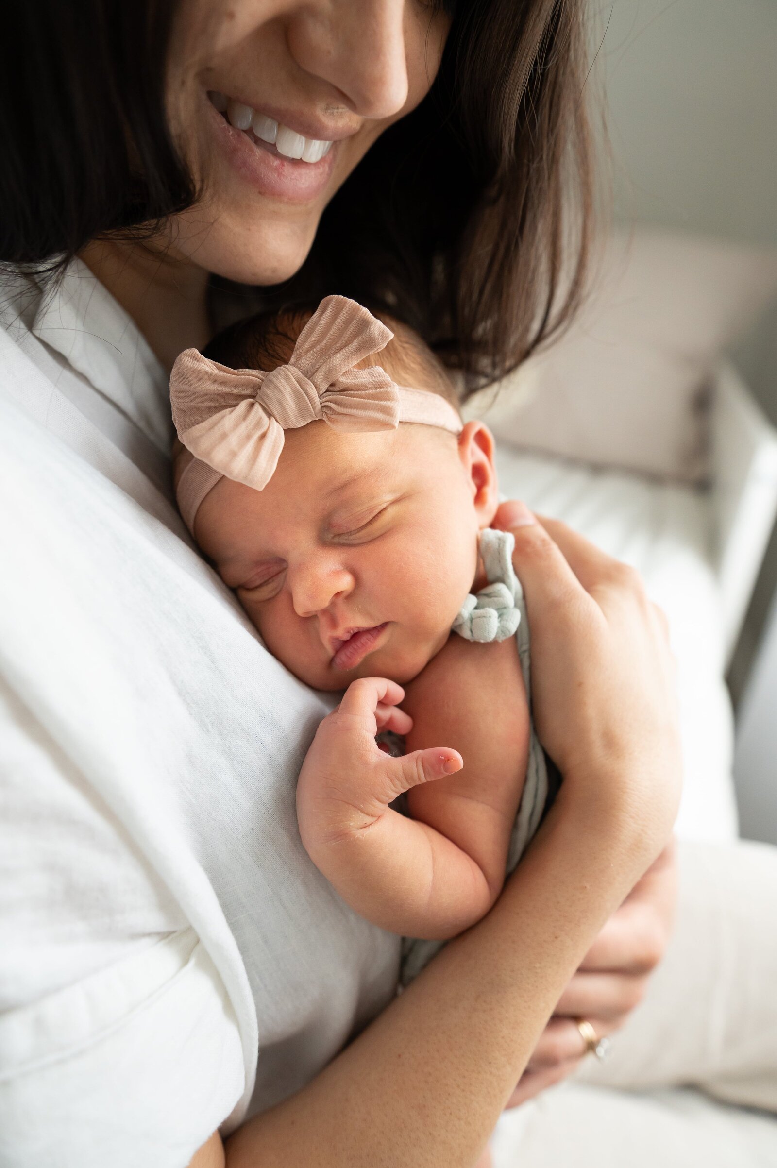 Newborn baby sleeping on momss chest