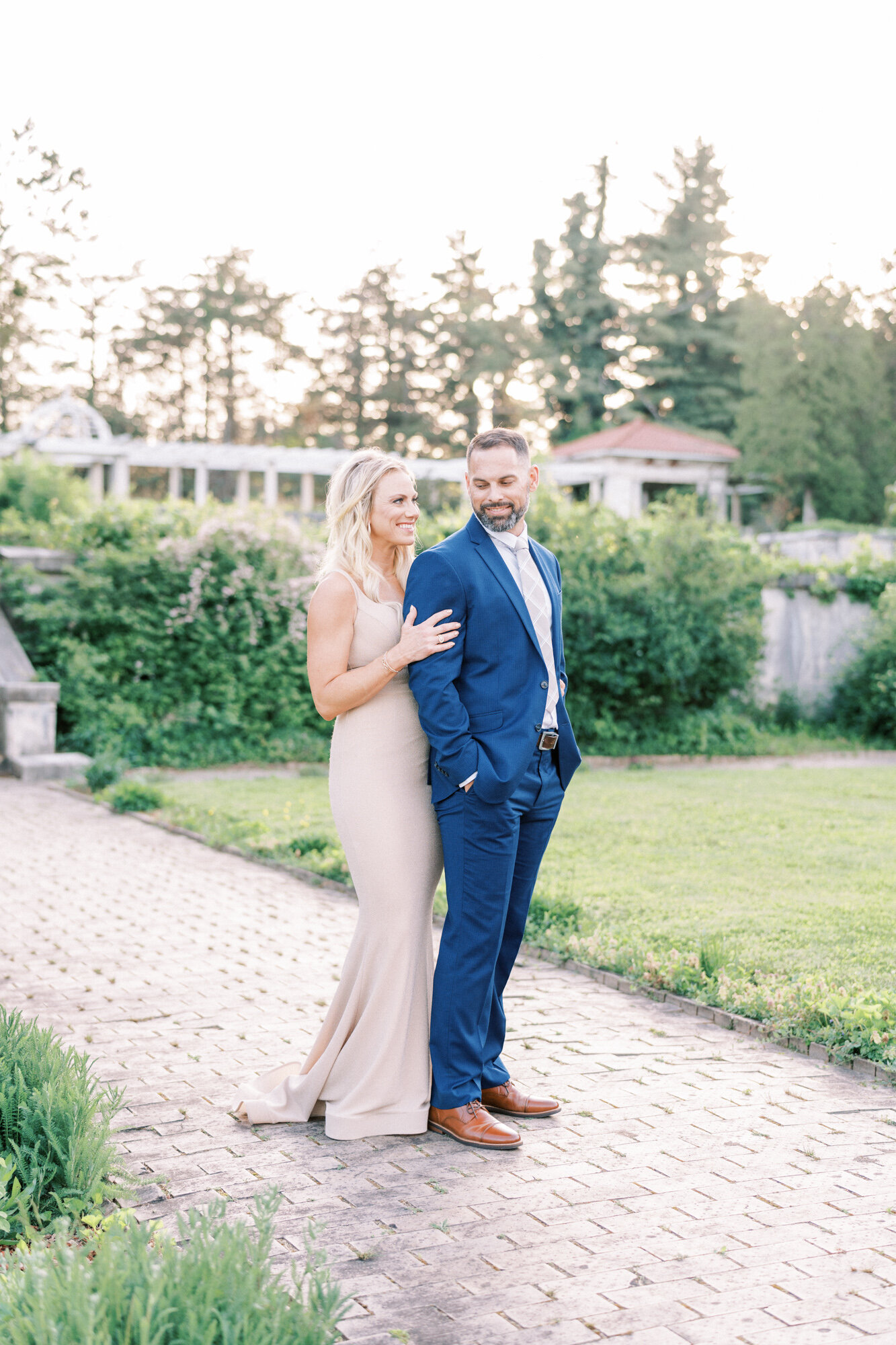 Newlyweds smile at each other in a courtyard in Washington DC